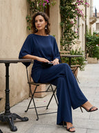 Genoveva | Completo elegante con blusa a mantella e pantaloni ampi