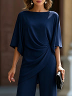 Genoveva | Completo elegante con blusa a mantella e pantaloni ampi