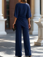 Genoveva | Completo elegante con blusa a mantella e pantaloni ampi