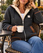Sandra | Giacca trapuntata con cappuccio e interno effetto sherpa